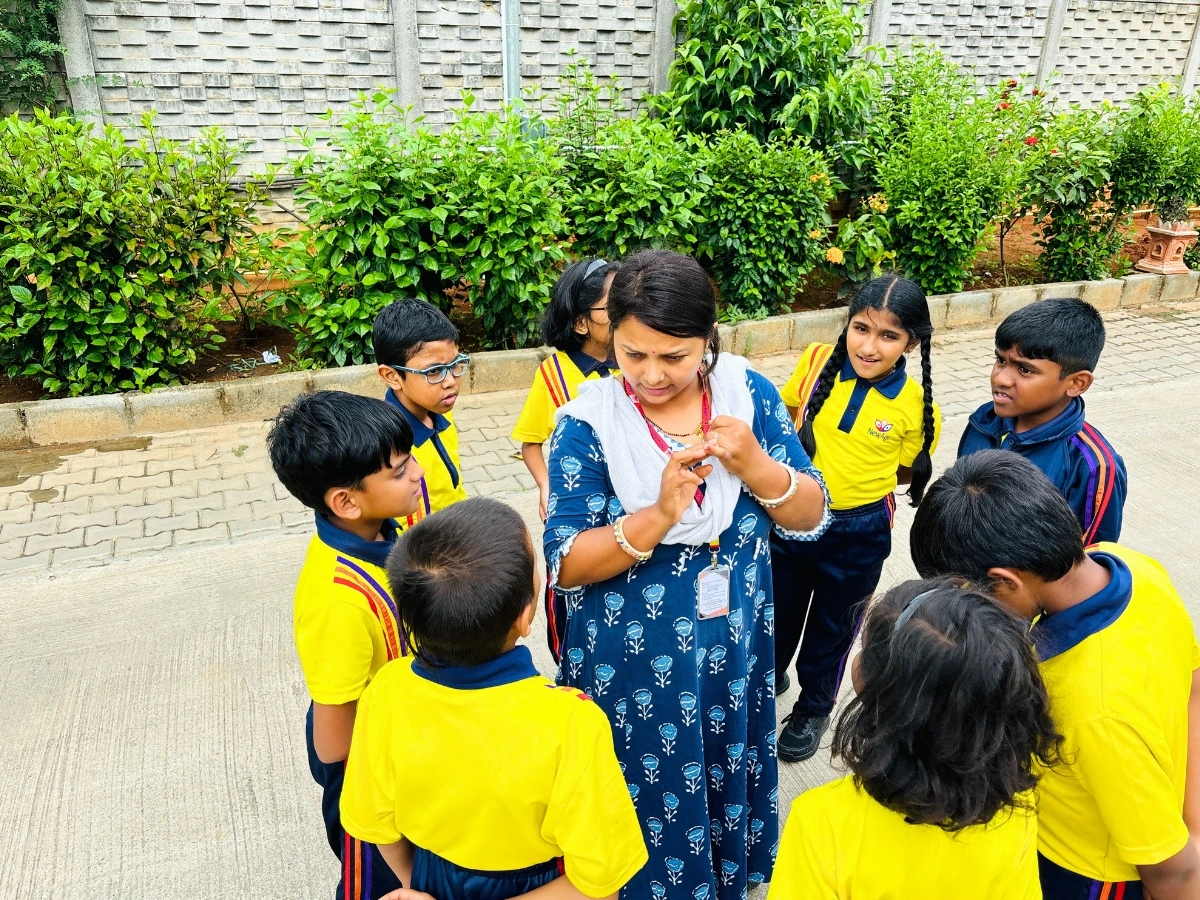 Teachers working together at NewAge World School